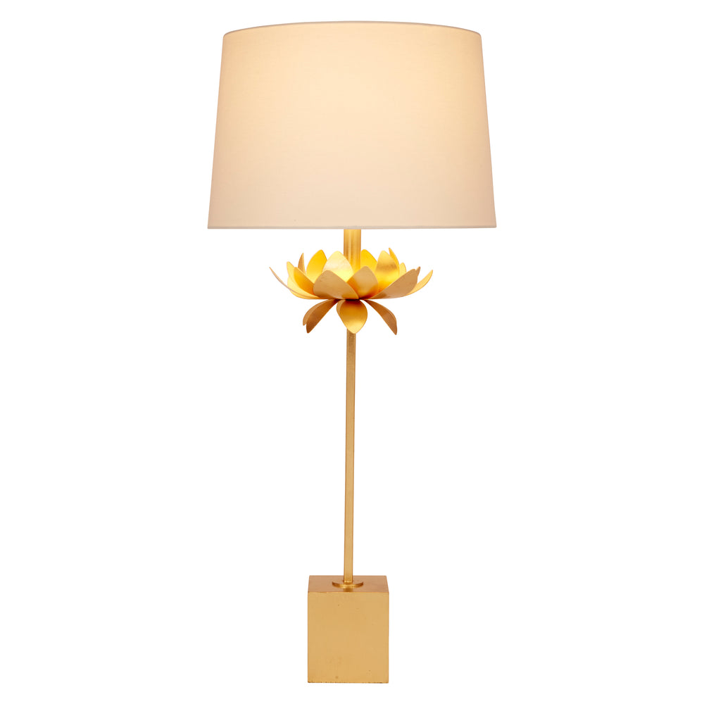 Decorative floor lamp with a beige lampshade and gold base on a white background