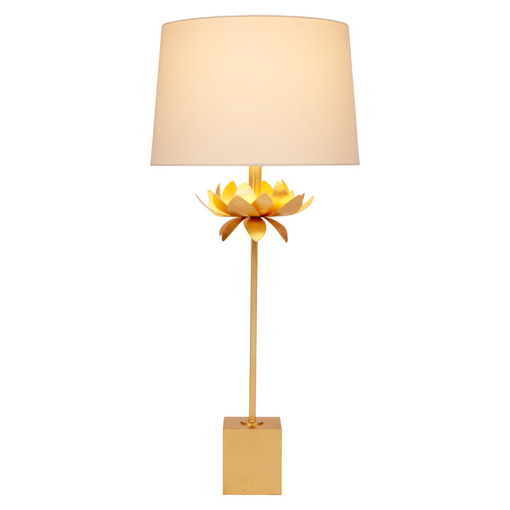 Decorative floor lamp with a beige lampshade and gold base on a white background