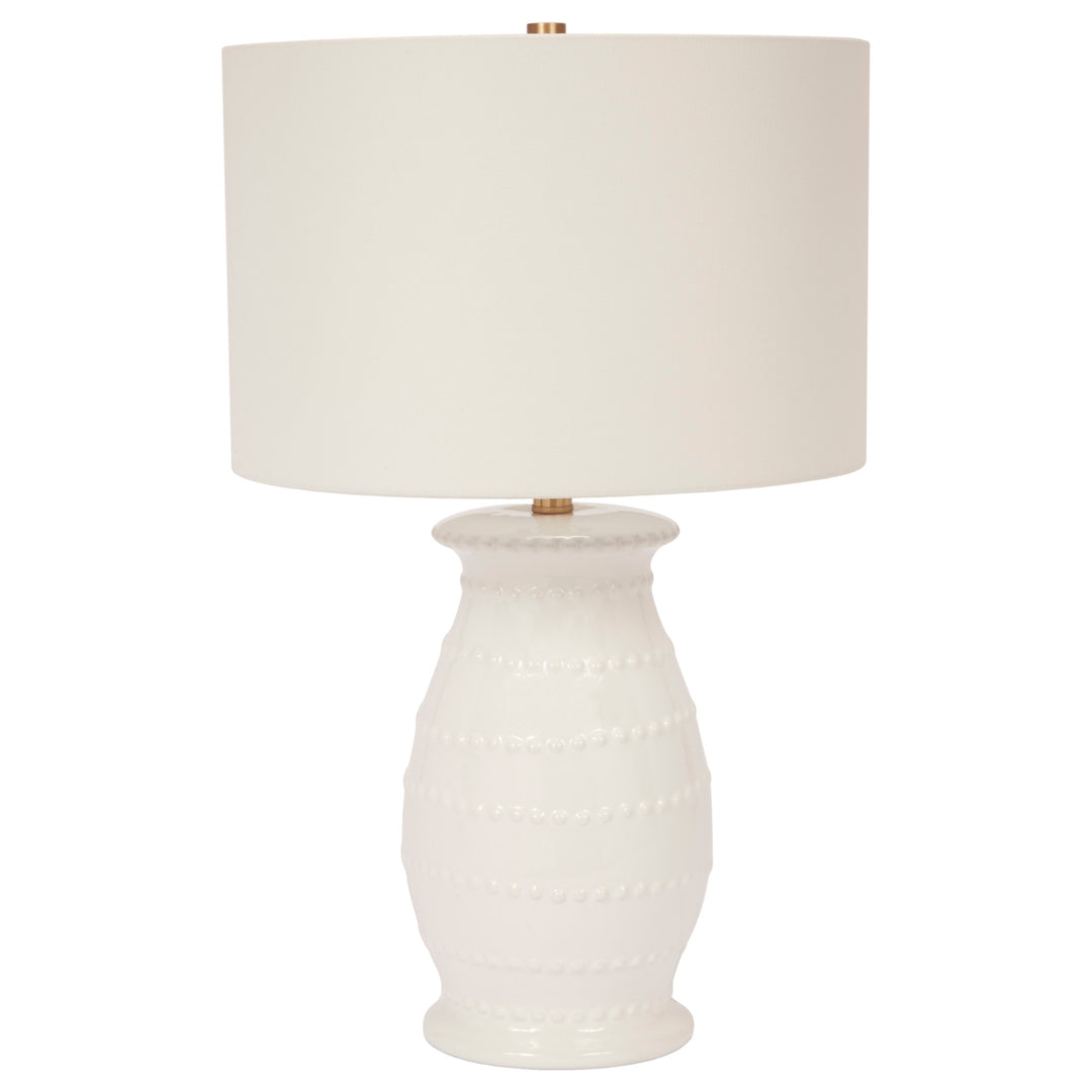 Elegant Caleb white ceramic table lamp, perfect for bedrooms, living rooms, or office spaces.