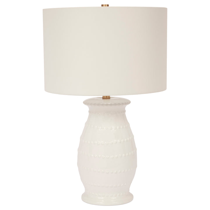 Elegant Caleb white ceramic table lamp, perfect for bedrooms, living rooms, or office spaces.