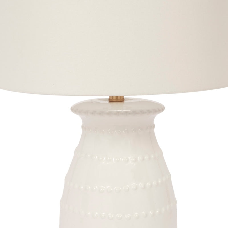 Ceramic table lamp: white shade over beaded ceramic base with brass top
