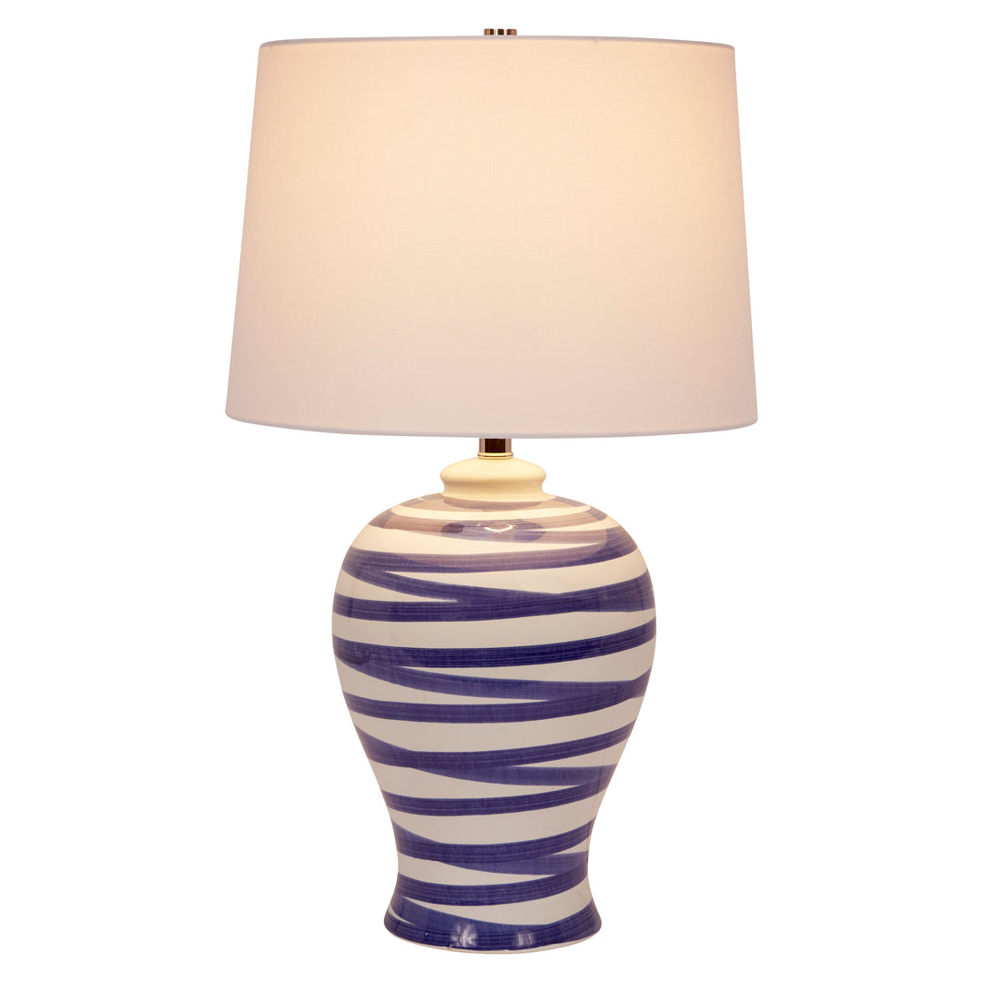 Stylish blue striped ceramic Lindell table lamp, adding a pop of color and modern charm to any room.