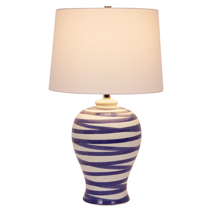 Stylish blue striped ceramic Lindell table lamp, adding a pop of color and modern charm to any room.