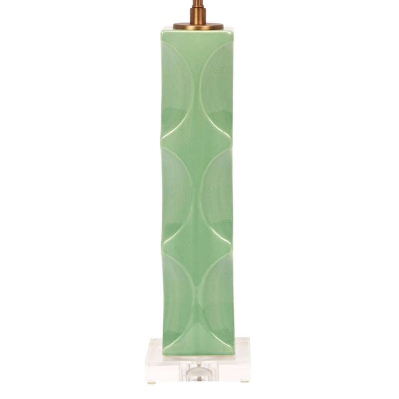 Green ceramic table lamp with white linen drum shade, brass hardware and square base