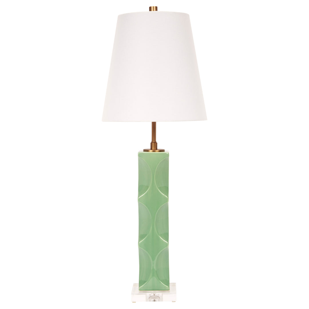 Modern green ceramic table lamp with a crisp white linen shade, perfect for contemporary or nature-inspired interiors.