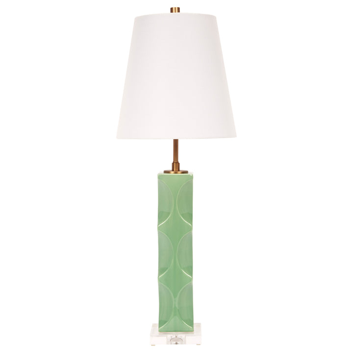 Modern green ceramic table lamp with a crisp white linen shade, perfect for contemporary or nature-inspired interiors.
