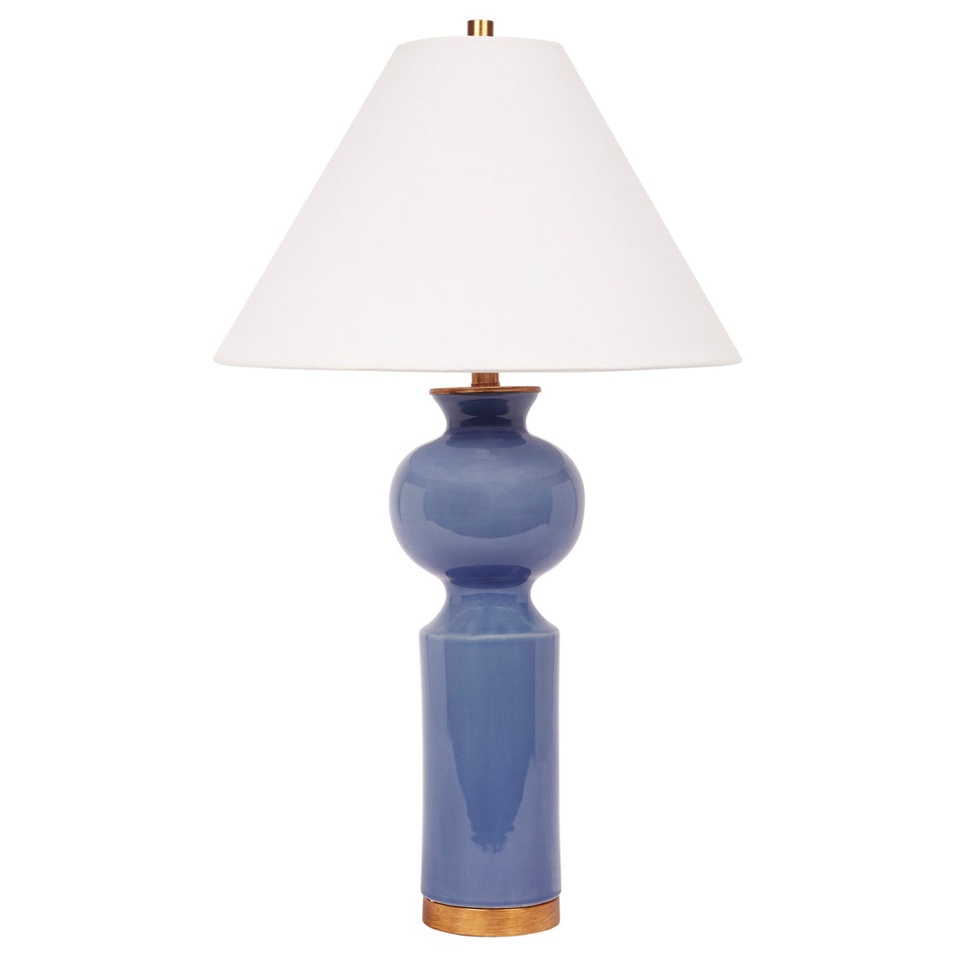 Elegant Parisian blue ceramic table lamp with a crisp white linen shade, perfect for classic and modern interiors.