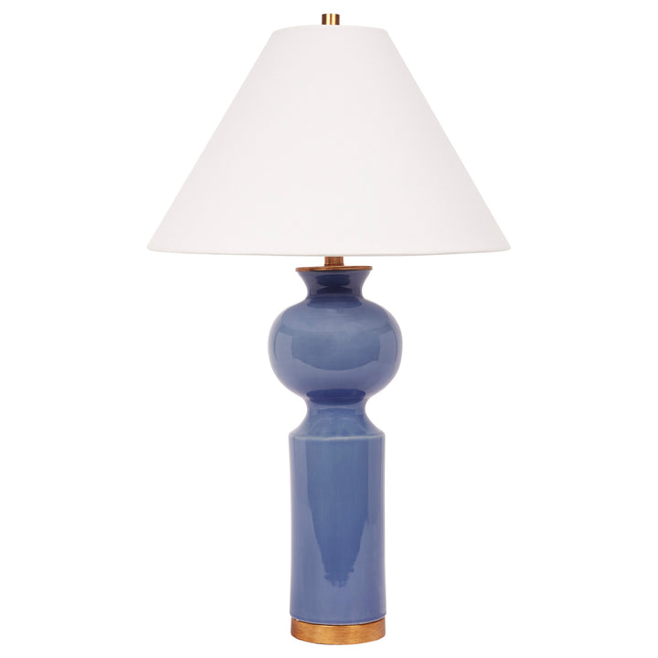Elegant Parisian blue ceramic table lamp with a crisp white linen shade, perfect for classic and modern interiors.