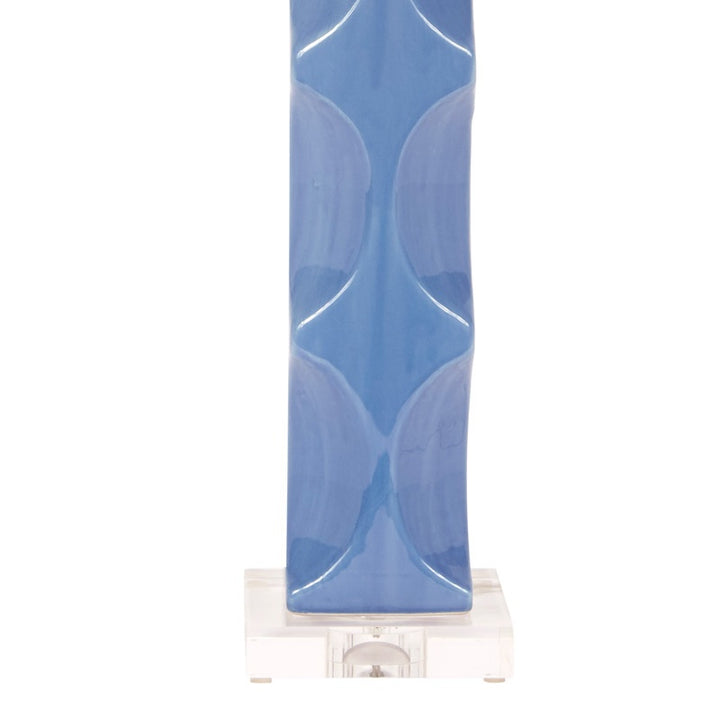 Blue ceramic table lamp base with glossy fluted design and clear base