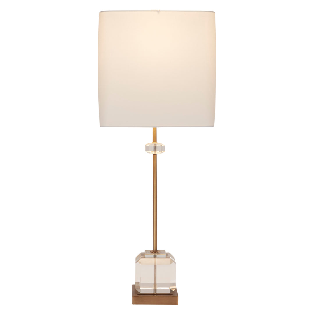 Stylish Eaton crystal and brass table lamp with white shade, adding a touch of luxury and modern elegance to any space.