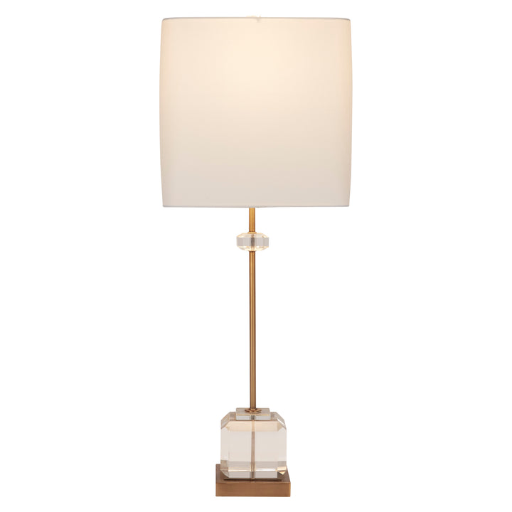 Stylish Eaton crystal and brass table lamp with white shade, adding a touch of luxury and modern elegance to any space.