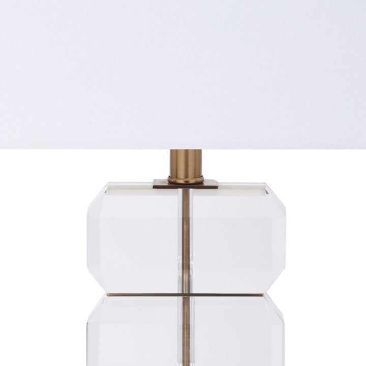 Bishop stacked crystal table lamp with white shade and brass center rod (close-up)