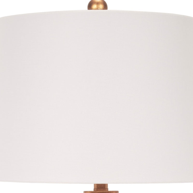 White linen drum shade with brass socket cap for orange buffet table lamp.