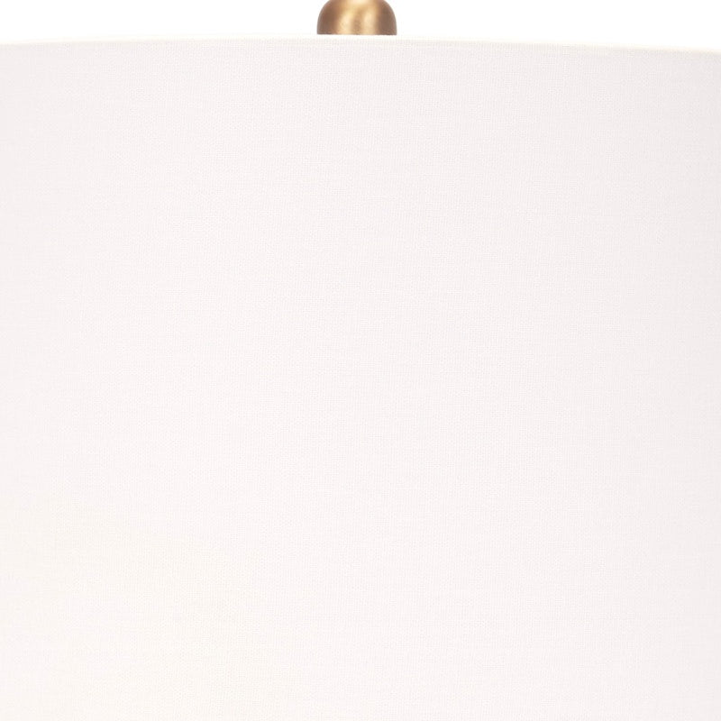 Ceramic table lamp with off-white shade and brass top
