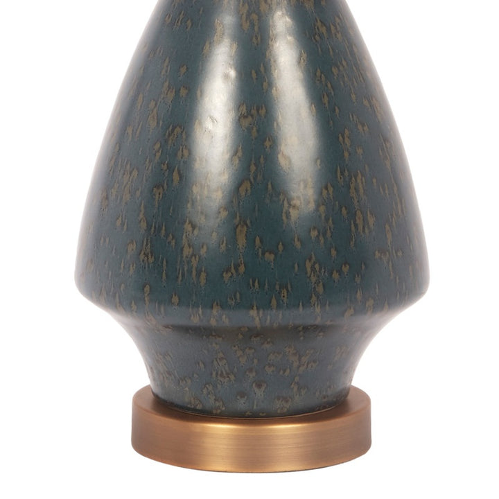 Blue ceramic table lamp base with gold fleck finish and brass base ring
