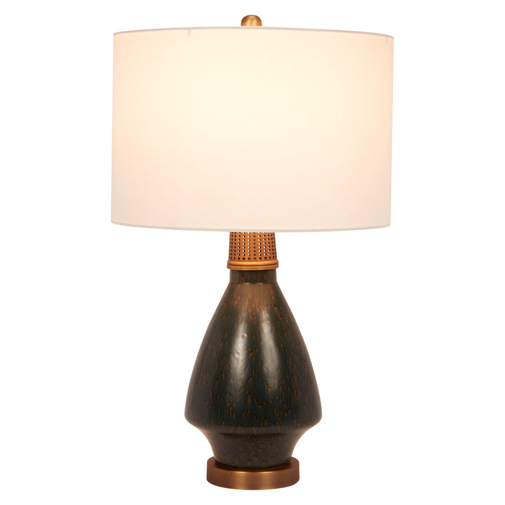 Stylish Waylon dark green ceramic table lamp with brass accents, adding a touch of luxury and modern charm to any space.