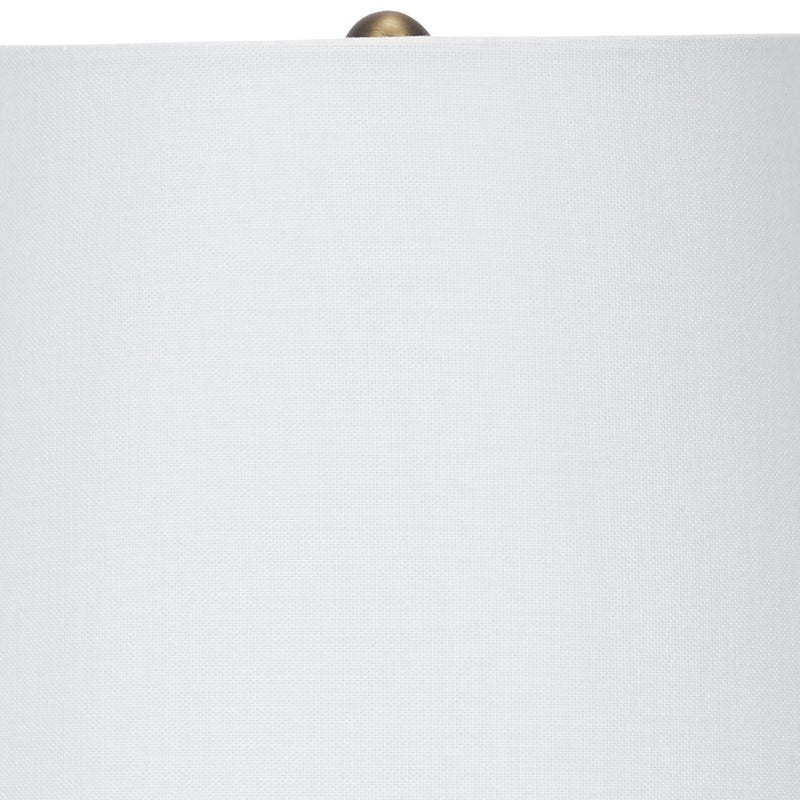 White linen lamp shade with small brass finial, top of ceramic table lamp