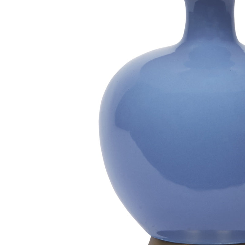 Dark blue ceramic lamp body with curved profile