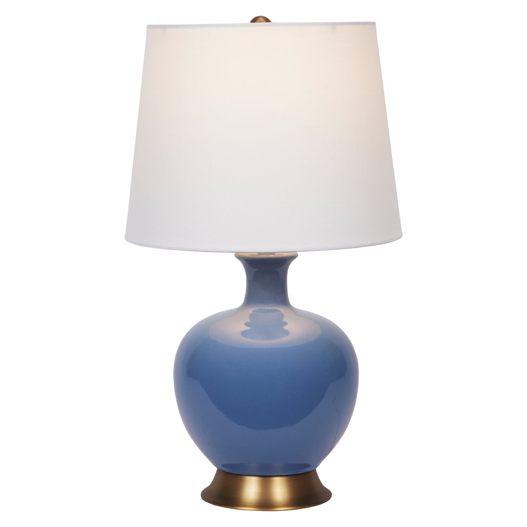 Stylish French blue ceramic lamp with a white linen shade, adding a serene and sophisticated touch to any room.