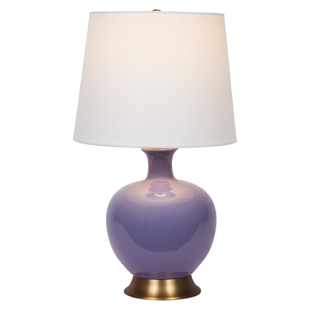 Charming lavender ceramic Lila lamp, bringing subtle color and sophistication to any bedroom or living space.
