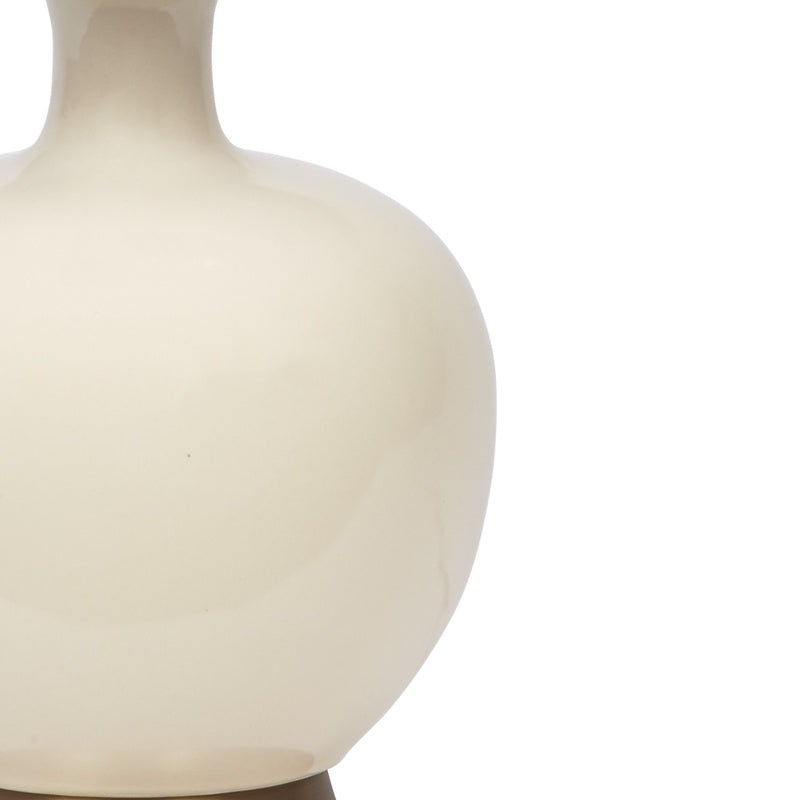 Cream ceramic table lamp body close-up with curved profile