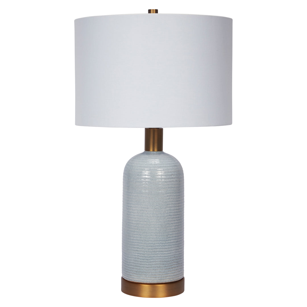 Elegant sky blue ceramic table lamp with a polished brass base, perfect for modern home interiors.