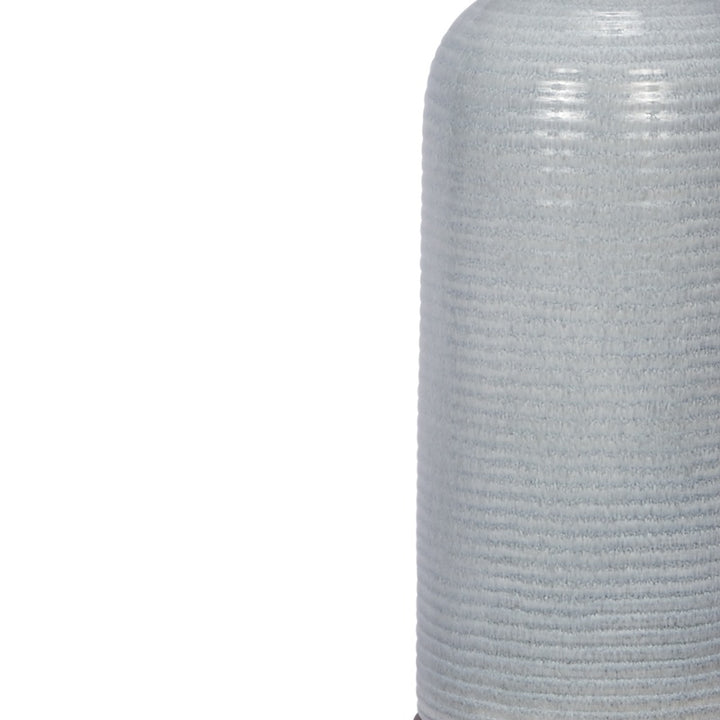 Light blue textured ceramic lamp body, ribbed surface detail