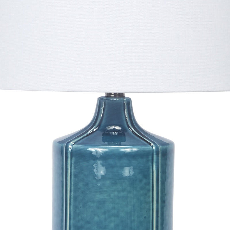 Teal ceramic table lamp base with metal socket and white shade
