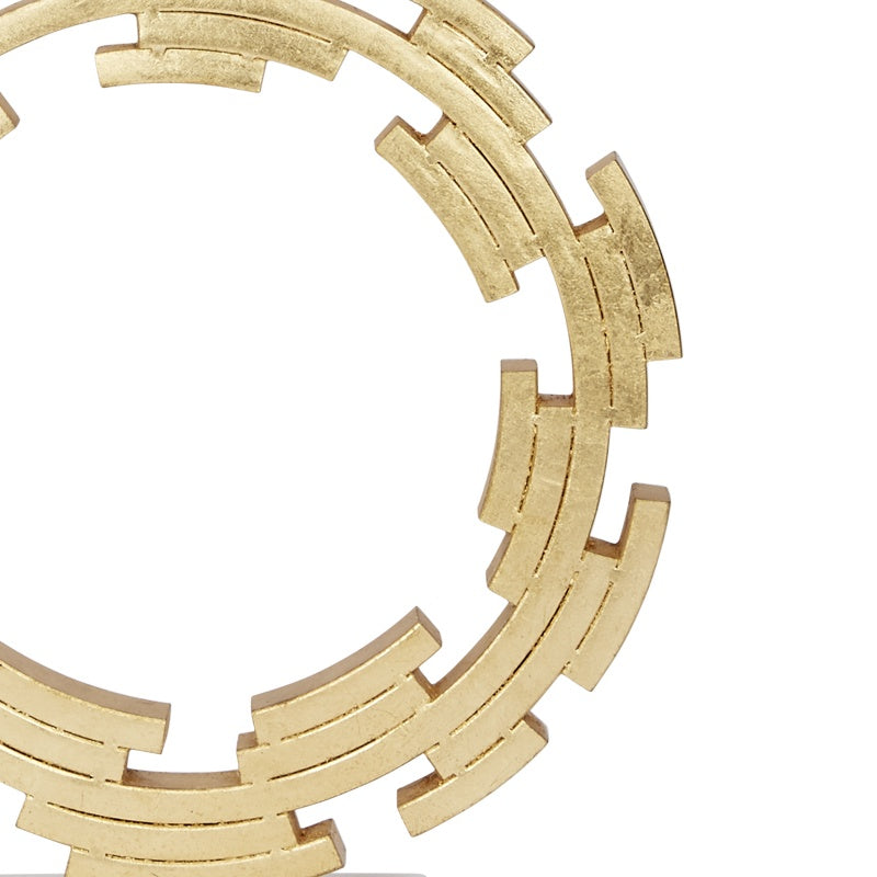 Gold metal segmented ring frame detail on lamp