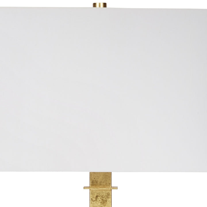 Gold faith lamp with white square shade and gold leaf cross detail