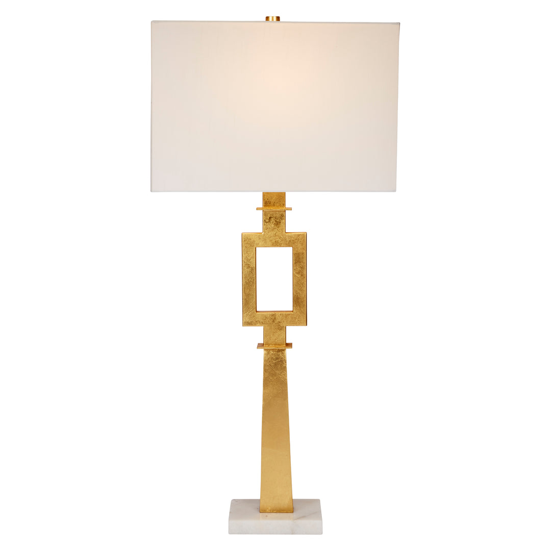 Stylish Faith lamp with gold leaf accents and white marble base, adding a touch of luxury and sophistication to any space.