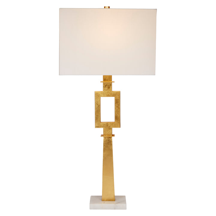 Stylish Faith lamp with gold leaf accents and white marble base, adding a touch of luxury and sophistication to any space.