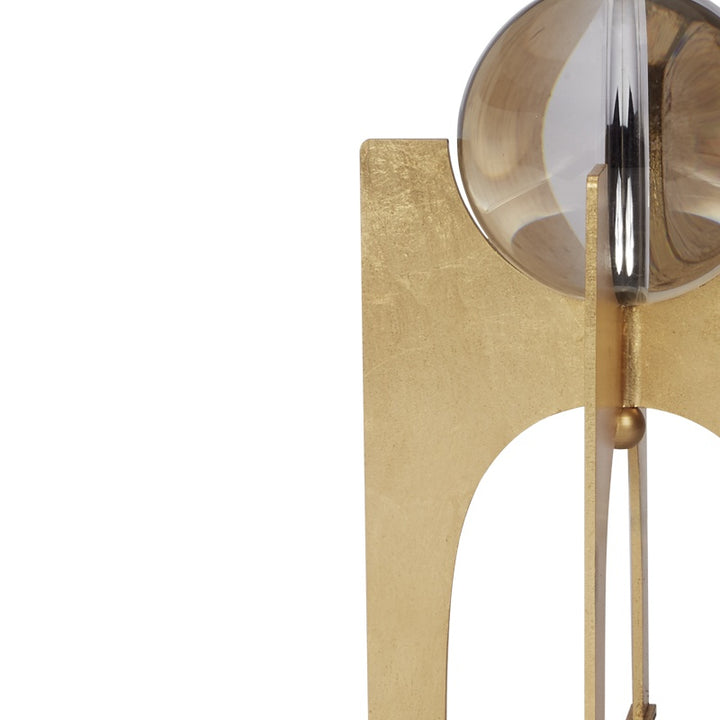 Gold leaf arched stand with crystal ball globe and brass detailing