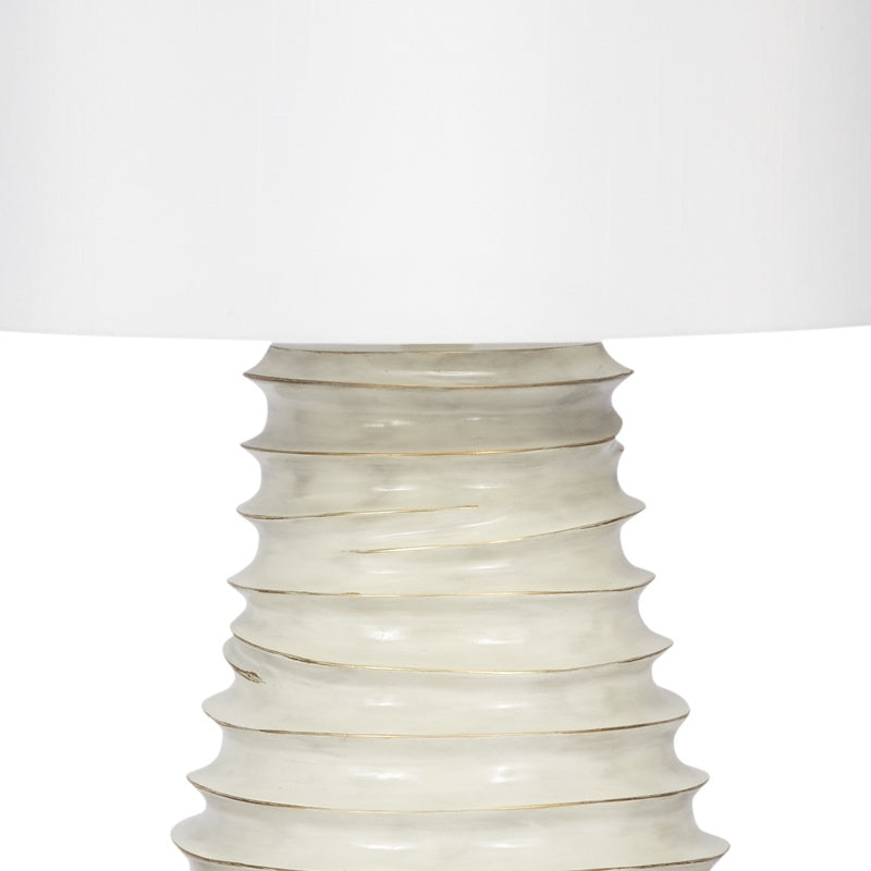 Cream ceramic lamp base with gold-washed ridges and white fabric shade