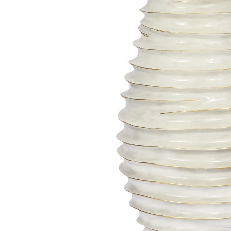 Ribbed cream ceramic lamp base with gold wash and white shade edge