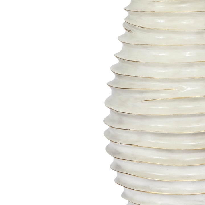 Ribbed cream ceramic lamp base with gold wash and white shade edge
