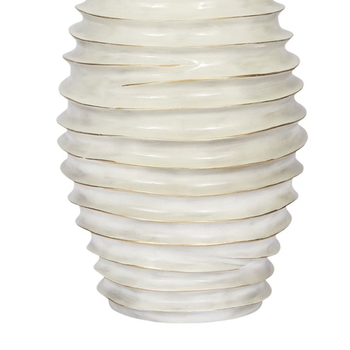 Cream ribbed ceramic lamp base with gold wash and white linen shade