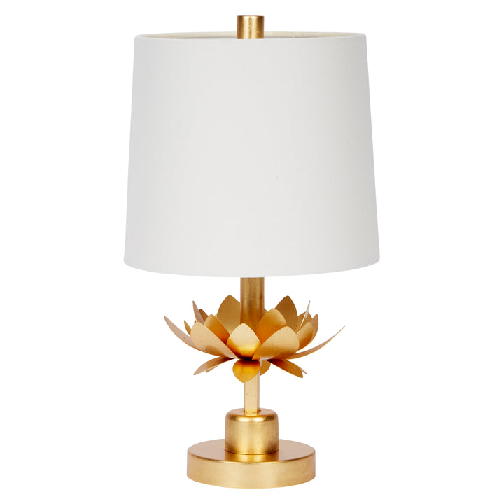 Table lamp with white shade and gold base on a white background