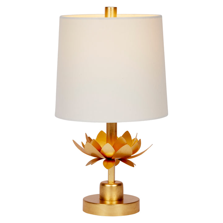 Table lamp with white shade and gold base on a white background