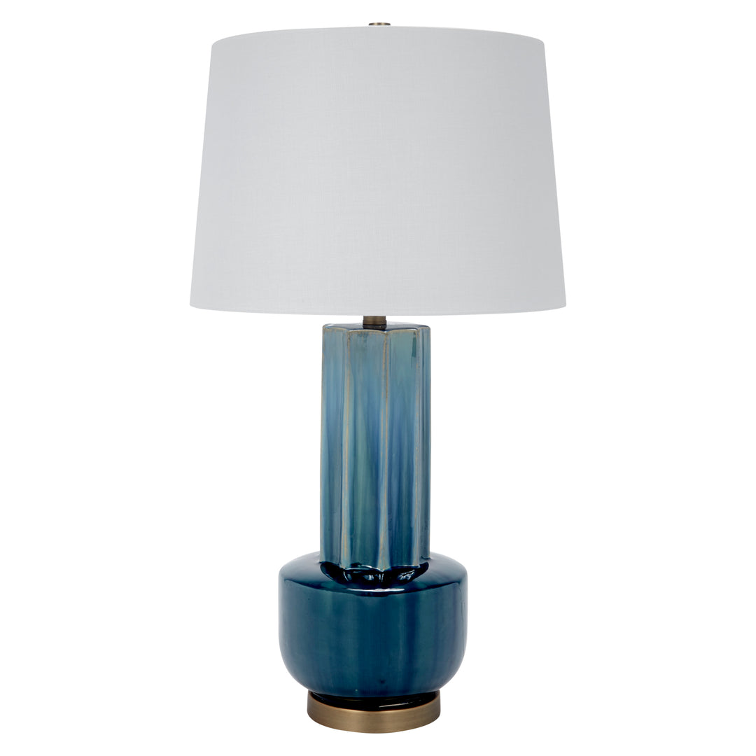 Blue-green ceramic table lamp with white drum shade and brass base