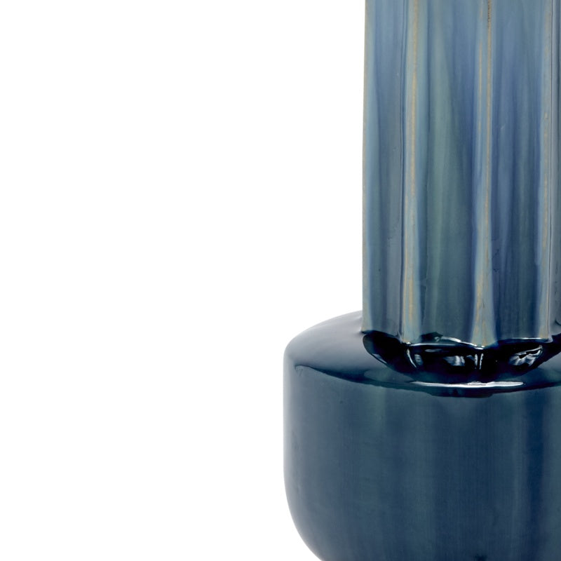 Blue-green ceramic lamp body with glossy dark rim and vertical striped texture