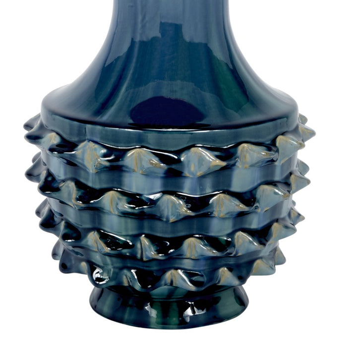 Glazed blue-green ceramic lamp base with stacked ruffle bands and curved neck