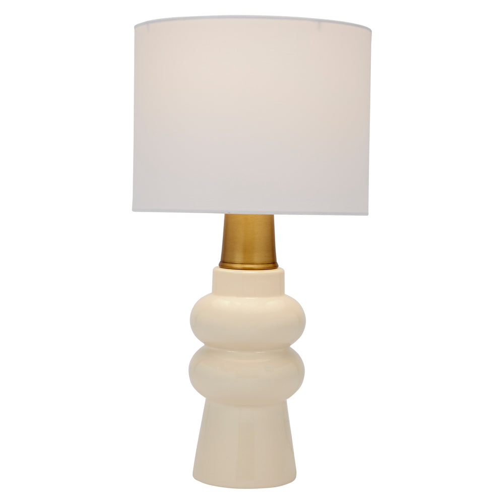 Chic cream ceramic Rhodes lamp with a white linen shade, adding warmth and timeless elegance to any room décor.