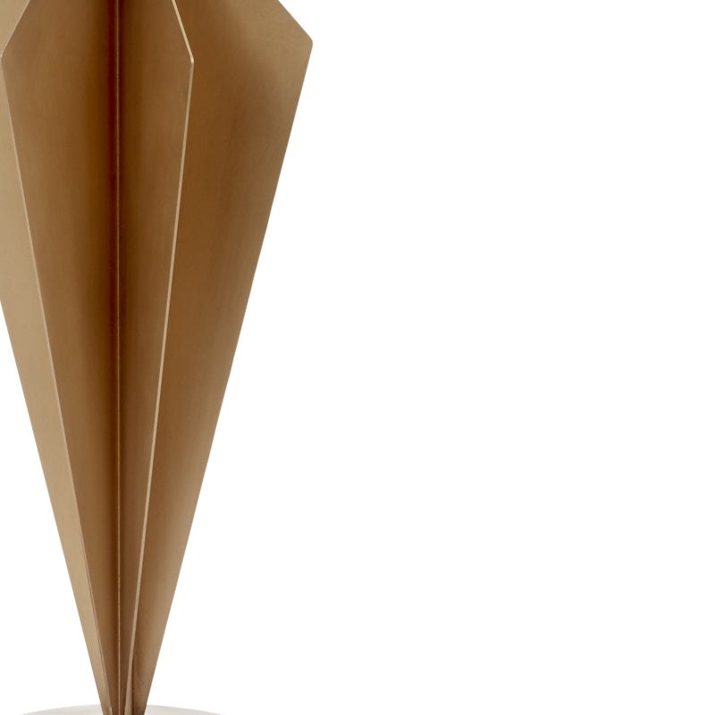 Gold faceted metal lamp body with pointed panels, close-up detail