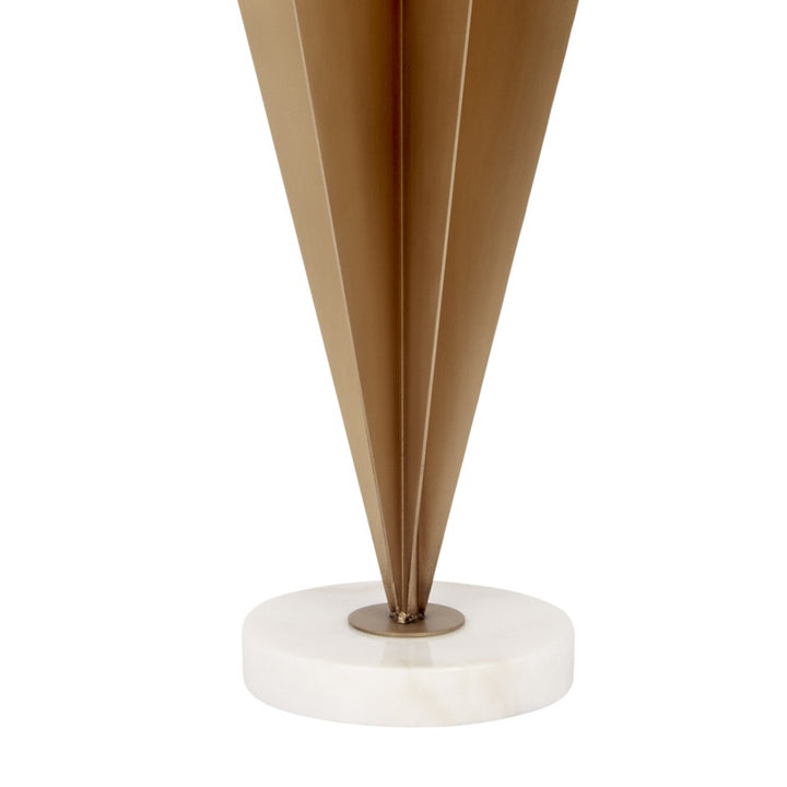 White round marble base with gold metal stem and faceted table lamp body