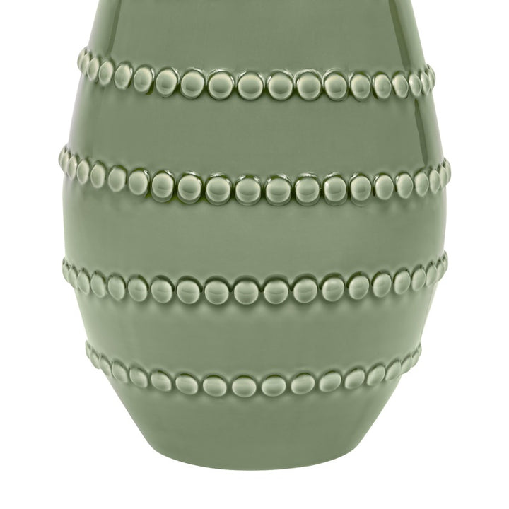 Green ceramic lamp base bottom with stacked beaded bands and smooth rounded shape.