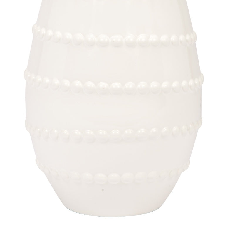Bottom half of white ceramic lamp base with stacked bead bands and smooth base