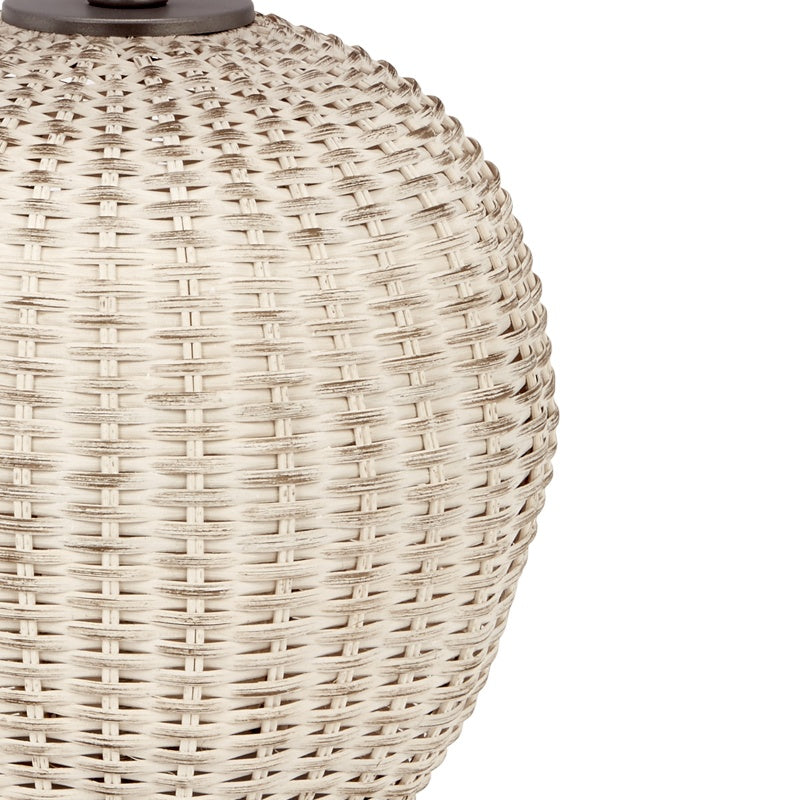 Woven rattan table lamp body with dense basket weave and dark top cap