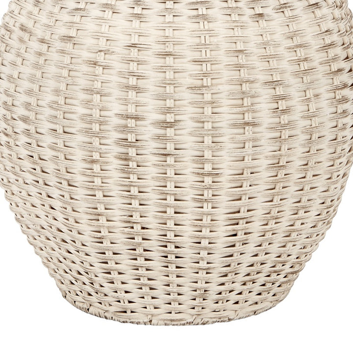 White-washed woven rattan table lamp base with curved basket weave pattern