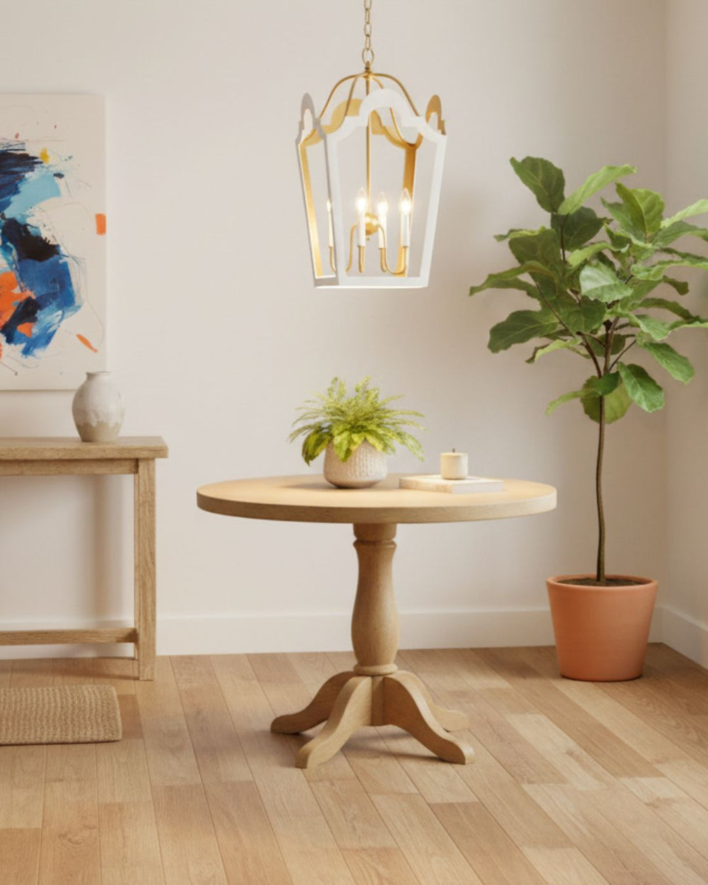 Stylish glossy white and gold Jackie lantern, adding a touch of modern elegance and sophistication to any space.